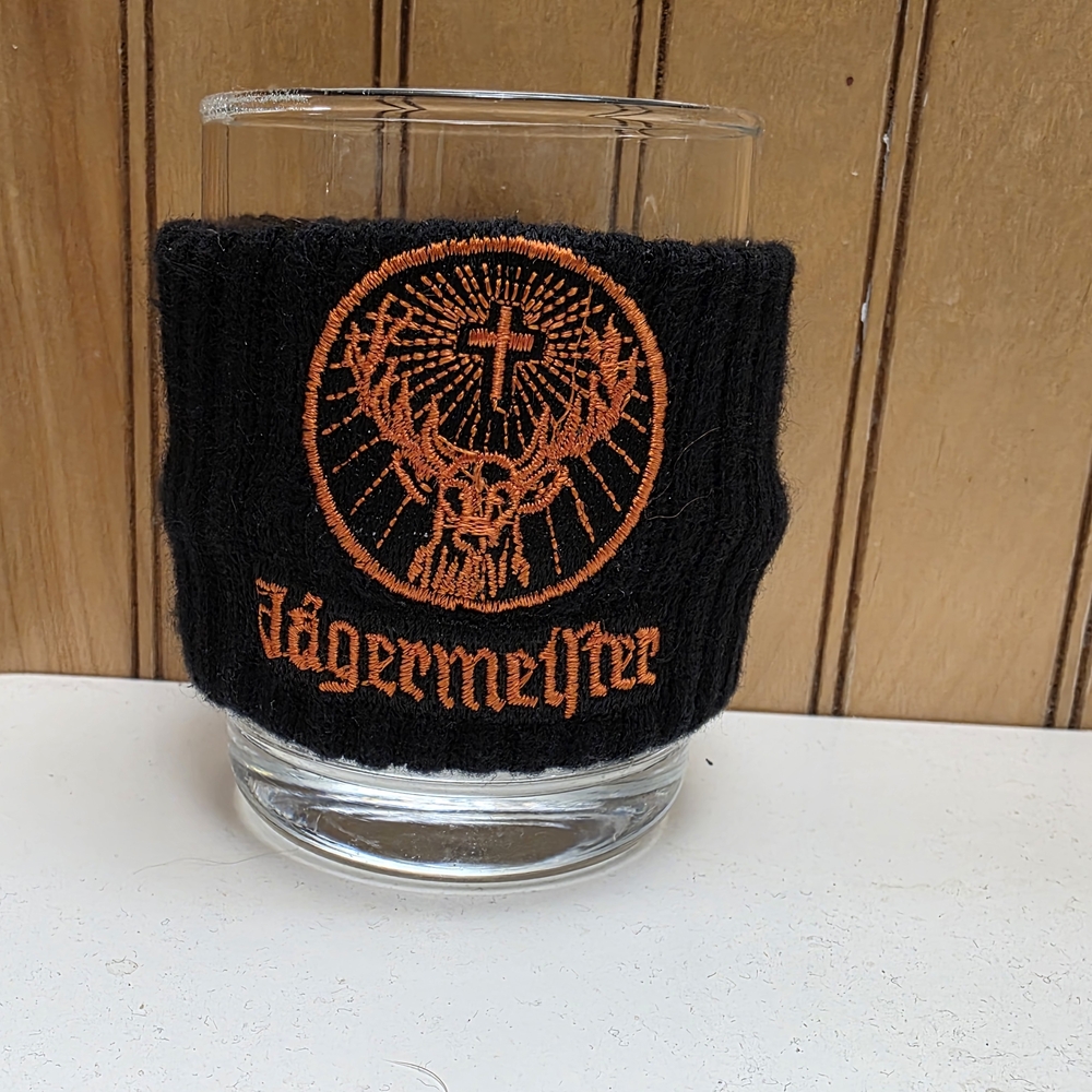 Jägermeister Black and Orange Glass Sleeve Or Wrist Sweat Band.